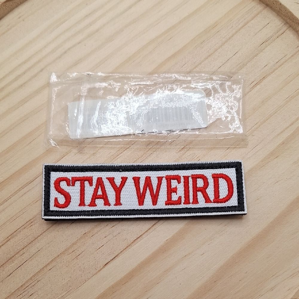 Stay Weird Patch with Red and Black Text